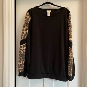 New without tags. Bibi black top. Size Large.